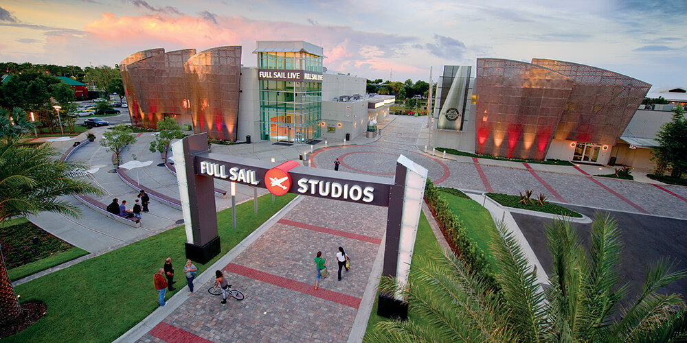 Ariel photograph of the Live Venue and Full Sail Studios archway, with students gathering.